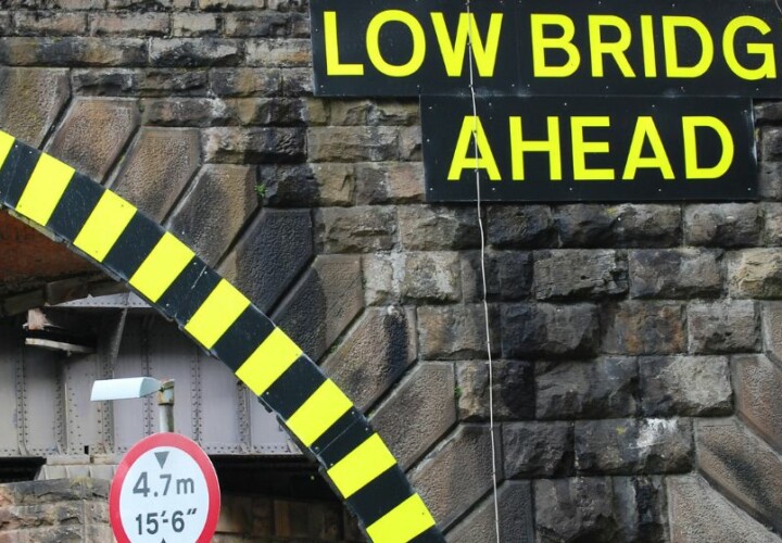 static hazard low bridge and 'low bridge ahead' sign