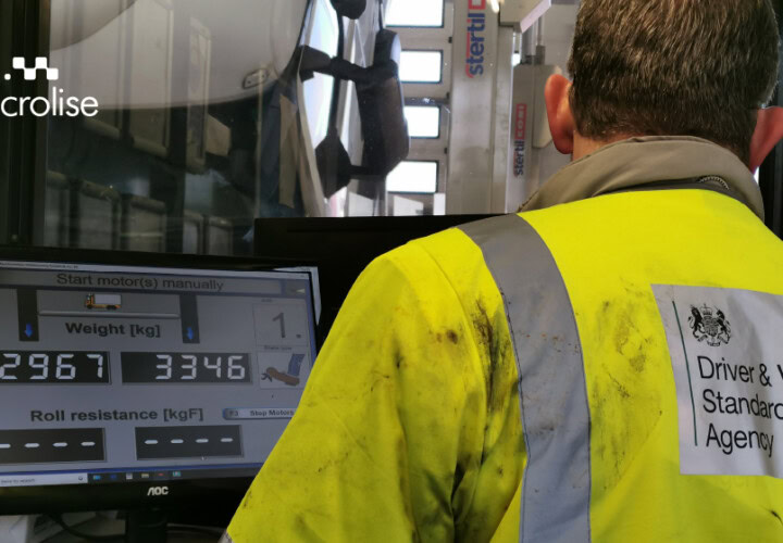 a mechanic operating an electronic brake performance monitoring system