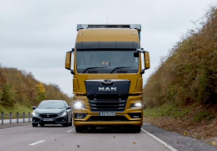 pallet/parcel lorry driving on a road using transport management system